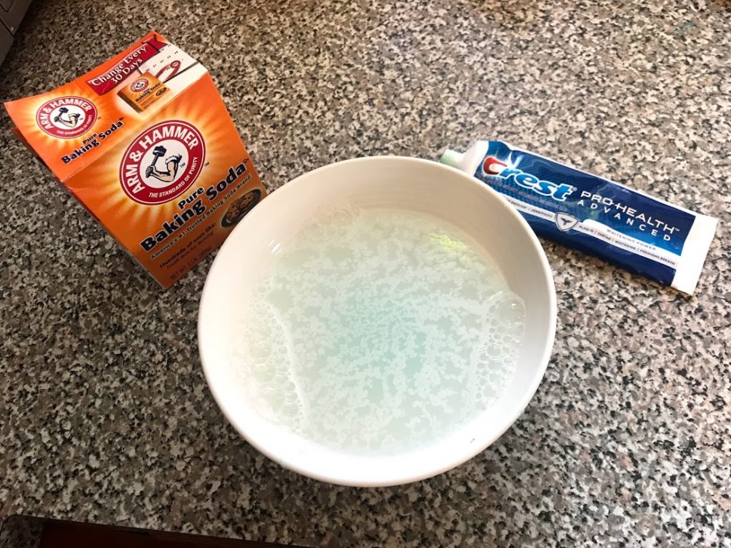 Baking soda toothpaste to clean cabinets - recipe from Grapes and Spendor #grapesandspendor #grimykitchen