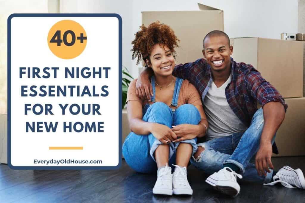 couple sitting in new home with boxes on their first night