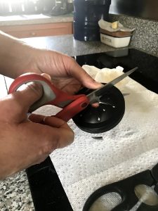 how to replace garbage disposal guard