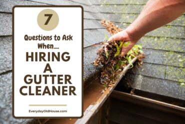 Photo up close of home gutters being cleaned