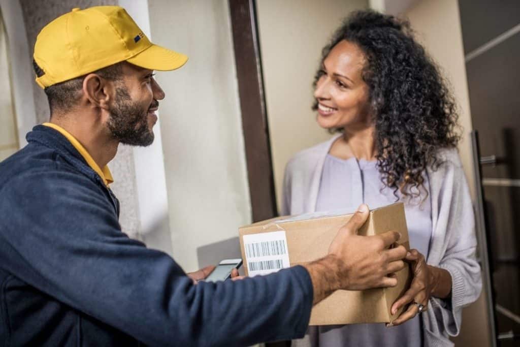 woman receiving package for delivery