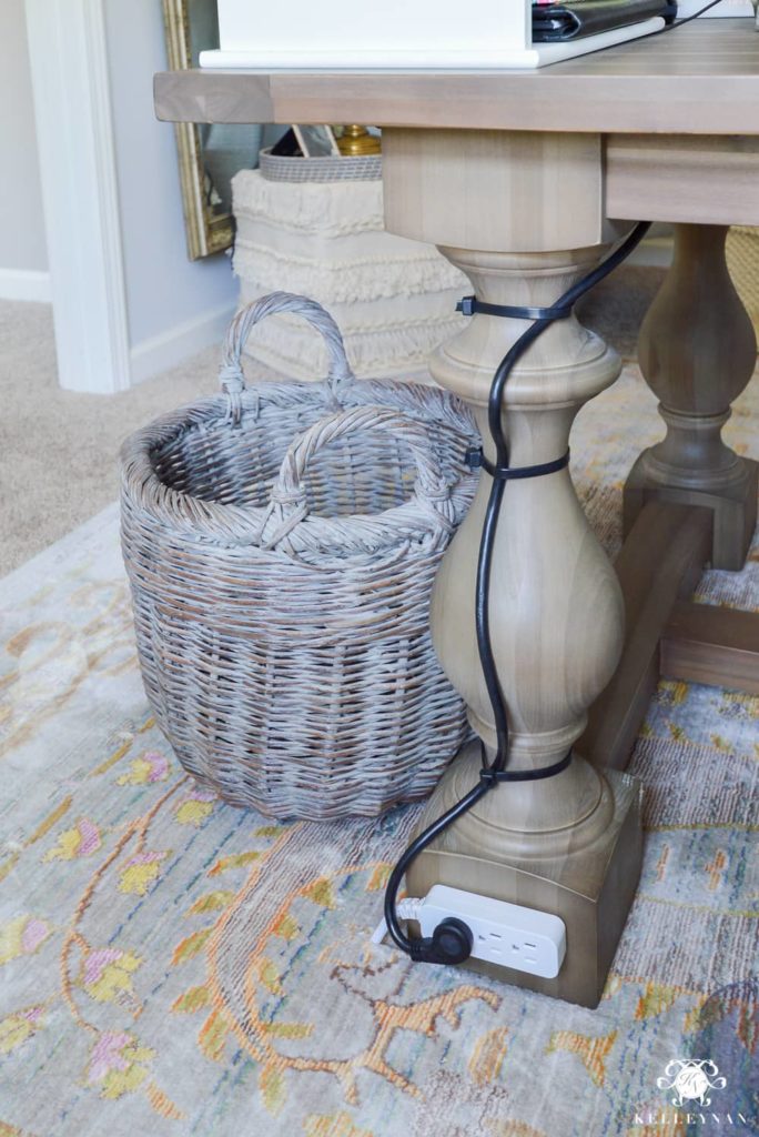 How to hide electrical cords behind table by KelleyNan.com #electricalcords