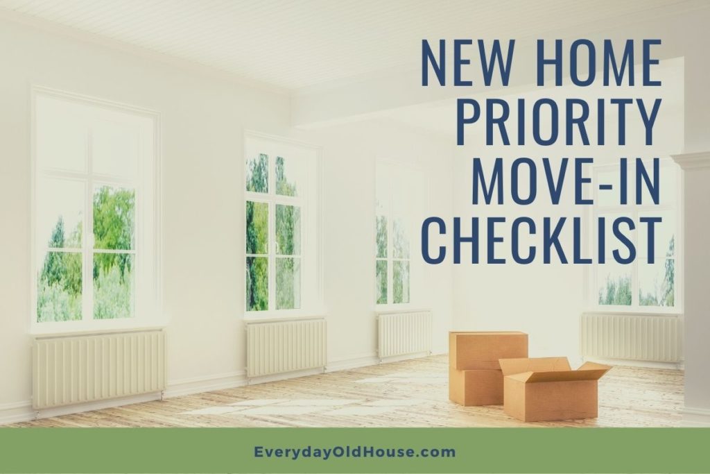 Empty house with open moving boxes to show New Home Priority To-do List in a Free Printable Checklist