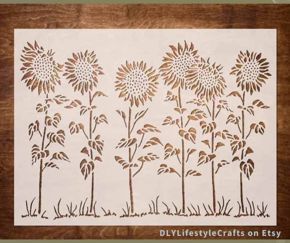 large row of sunflower stencils perfect for designs on rain barrels  courtesy of DLYLifestyleCrafts on Etsy