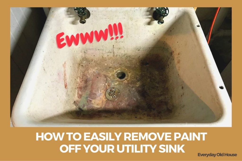 Old utility sink with layers of paint and gunk