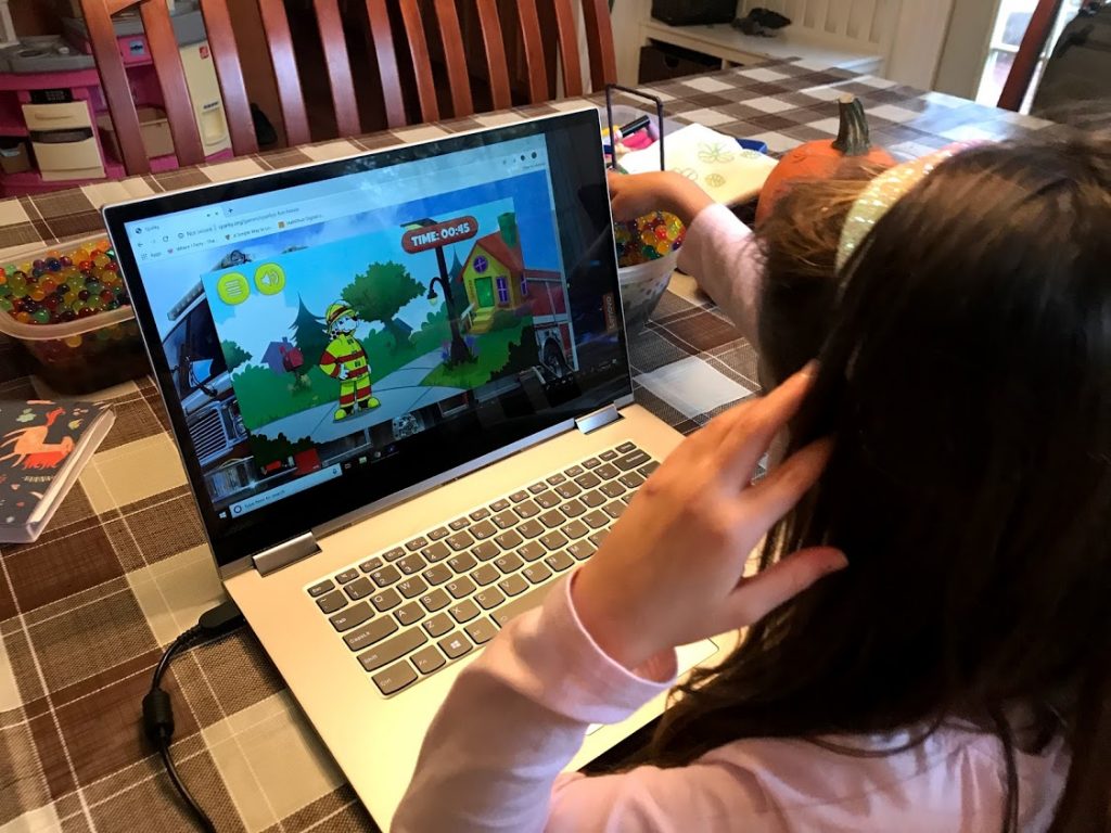 Playing online games with Sparky the FIre Dog to learn about home fire safety #firesafety #homefiredrillday #NFPA #sparkythefiredog