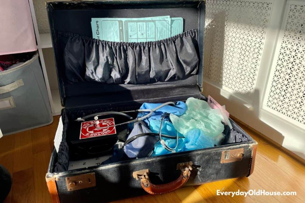 upcycled suitcase holding doctor toys for children