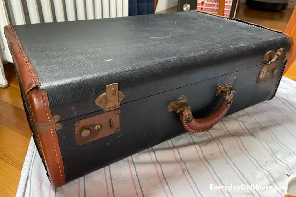 photo of vintage suitcase with tarnished hardware