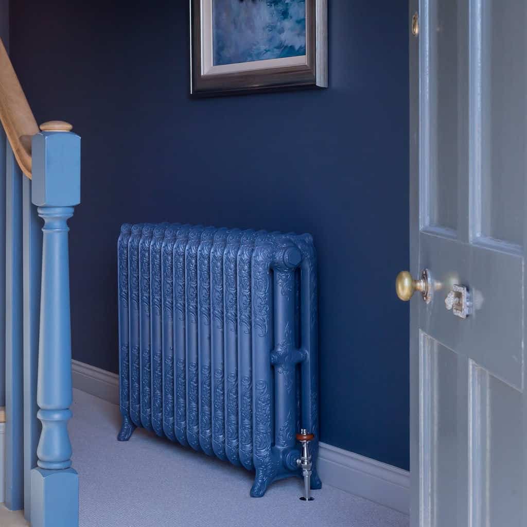 Beautiful blue cast iron radiator matches entryway on this Paladin radiator #paladin #bluecastironradiator