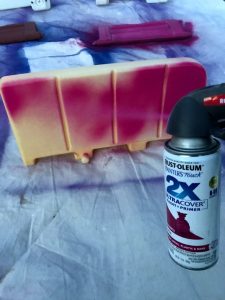 Spray painting a Step2 Plastic playhouse using Rust-Oleums comfort grip holder and Painter's Touch 2x spray paint #spraypaint #weekendproject #kidsoutdoortoys